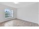 Bedroom with tile floors and window with blinds at 2717 Shelby Ruth Pl, St Cloud, FL 34769