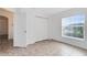 Bright bedroom featuring tile floors and a double door closet at 2717 Shelby Ruth Pl, St Cloud, FL 34769