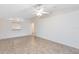 Spacious living room featuring tile floors and access to a patio at 2717 Shelby Ruth Pl, St Cloud, FL 34769