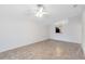 Open living area with tile flooring and a ceiling fan at 2717 Shelby Ruth Pl, St Cloud, FL 34769