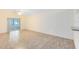 Bright and airy living room with sliding glass doors to a patio at 2717 Shelby Ruth Pl, St Cloud, FL 34769
