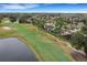 Aerial photo of home with screened enclosure at 296 Del Sol Ave, Davenport, FL 33837