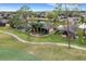 Aerial view showing home with pool and golf course at 296 Del Sol Ave, Davenport, FL 33837