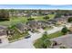 Aerial view of homes on a golf course community at 296 Del Sol Ave, Davenport, FL 33837