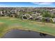 Aerial view of home with backyard on golf course at 296 Del Sol Ave, Davenport, FL 33837