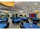 Large banquet hall with round tables and a stage at 296 Del Sol Ave, Davenport, FL 33837