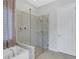 Bathroom featuring a walk-in shower and garden tub at 296 Del Sol Ave, Davenport, FL 33837