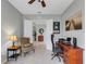 Bright home office with built-in shelving and two workspaces at 296 Del Sol Ave, Davenport, FL 33837