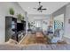 Spacious living room featuring comfortable seating and built-in shelving at 296 Del Sol Ave, Davenport, FL 33837