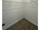 Large walk-in closet with wire shelving for storage at 3237 Energy Drive, Kissimmee, FL 34747