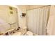 Well-lit bathroom with shower/tub, granite vanity, and updated fixtures at 421 Disa Dr, Davenport, FL 33837