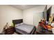 Cozy bedroom with double bed and dark brown dresser at 421 Disa Dr, Davenport, FL 33837