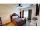 Bright bedroom with double bed and window at 421 Disa Dr, Davenport, FL 33837