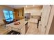 Open concept kitchen with island and stainless steel appliances at 421 Disa Dr, Davenport, FL 33837