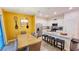 Open concept kitchen with island and stainless steel appliances at 421 Disa Dr, Davenport, FL 33837