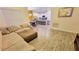 Open living room with a view into the kitchen and dining area at 421 Disa Dr, Davenport, FL 33837