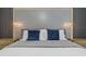 Bright bedroom with a modern headboard and nightstands at 4370 Rhyme St, Kissimmee, FL 34746