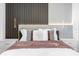 Modern bedroom with wood accent wall and a cozy feel at 4370 Rhyme St, Kissimmee, FL 34746