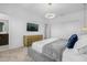 Spacious bedroom with large TV and dresser at 4370 Rhyme St, Kissimmee, FL 34746