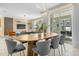 Modern dining room with oval wood table and chairs at 4370 Rhyme St, Kissimmee, FL 34746