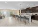 Modern kitchen with island and stainless steel appliances at 4370 Rhyme St, Kissimmee, FL 34746