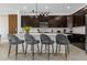 Modern kitchen with island and breakfast bar seating at 4370 Rhyme St, Kissimmee, FL 34746