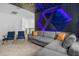 Star Wars themed theater room with sectional sofa and two armchairs at 4370 Rhyme St, Kissimmee, FL 34746