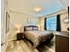 Cozy bedroom with a queen-size bed and nightstands at 4741 Clock Tower Dr # 306, Kissimmee, FL 34746