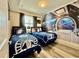 Themed bedroom with twin beds and Star Wars decor at 4741 Clock Tower Dr # 306, Kissimmee, FL 34746