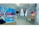 Frozen-themed bedroom with twin bed and desk at 4741 Clock Tower Dr # 306, Kissimmee, FL 34746