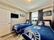 Themed bedroom with twin beds and Star Wars decor at 4741 Clock Tower Dr # 306, Kissimmee, FL 34746