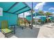 Relax in the shade at the poolside cabanas at 4741 Clock Tower Dr # 306, Kissimmee, FL 34746