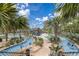 Resort-style pool with lazy river and playground at 4741 Clock Tower Dr # 306, Kissimmee, FL 34746