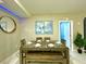 Dining area with wooden table and bench seating at 4741 Clock Tower Dr # 306, Kissimmee, FL 34746