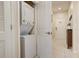 Stackable washer and dryer in a convenient laundry closet at 4741 Clock Tower Dr # 306, Kissimmee, FL 34746