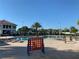 Community pool with connect four game at 4741 Clock Tower Dr # 306, Kissimmee, FL 34746