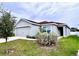 Newly built home with a spacious front yard at 505 Pentas Ln, Haines City, FL 33844