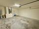 Spacious garage with mechanicals, utility sink and ample room for storage and parking at 505 Pentas Ln, Haines City, FL 33844