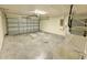 Spacious garage with a sink and ample room for storage at 505 Pentas Ln, Haines City, FL 33844