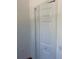 White bi-fold closet doors in bedroom at 6413 Astor Village # 210, Orlando, FL 32835