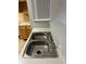 Clean kitchen sink with double basin and faucet at 6413 Astor Village # 210, Orlando, FL 32835