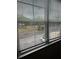Window view of parking lot and surrounding area at 6413 Astor Village # 210, Orlando, FL 32835