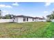 House with solar panels and a spacious backyard at 667 Heraldo Ct, Kissimmee, FL 34758