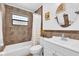Clean bathroom with updated fixtures and tile at 667 Heraldo Ct, Kissimmee, FL 34758