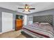 Spacious bedroom with a king-size bed and ample closet space at 667 Heraldo Ct, Kissimmee, FL 34758