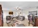 Open living room with a view into the dining area at 667 Heraldo Ct, Kissimmee, FL 34758