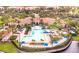 Resort-style pool and community center with lush landscaping at 8296 Portofino Dr # 102, Davenport, FL 33896