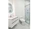 Bathroom with marble tile, floating vanity, and a large shower at 8296 Portofino Dr # 102, Davenport, FL 33896