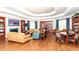Relaxing community room with comfortable seating and a fireplace at 8296 Portofino Dr # 102, Davenport, FL 33896