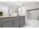 Bathroom with double vanity, tub and shower at 8985 Stinger Dr, Davenport, FL 33896